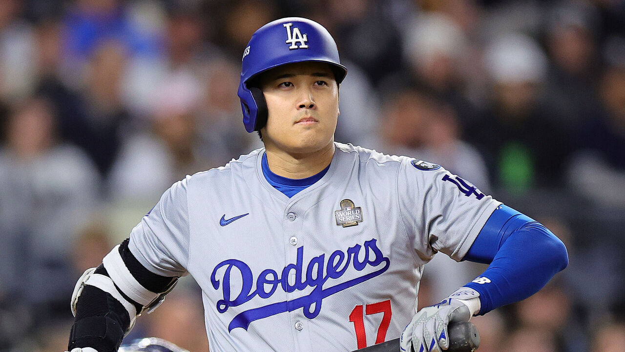 NEW YORK, NEW YORK - OCTOBER 28: Shohei Ohtani #17 of the Los Angeles Dodgers reacts after being walked in the first inning against the New York Yankees during Game Three of the 2024 World Series at Yankee Stadium on October 28, 2024 in the Bronx borough of New York City.