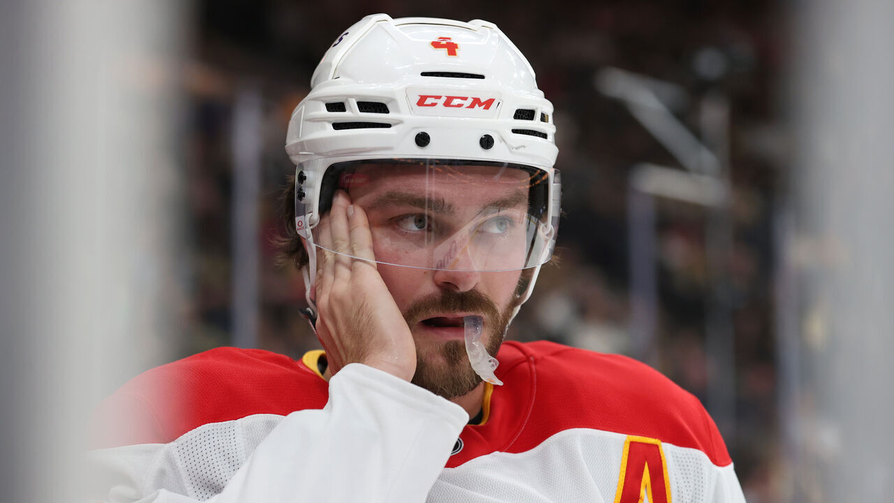 LAS VEGAS, NEVADA - OCTOBER 28: Rasmus Andersson #4 of the Calgary Flames reacts during the second period against the Vegas Golden Knights at T-Mobile Arena on October 28, 2024 in Las Vegas, Nevada.