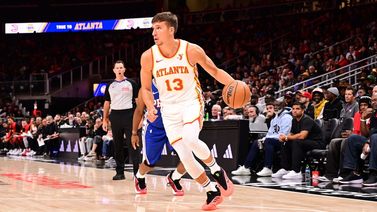 ATLANTA, GA - OCTOBER 14: Bogdan Bogdanovic #13 of the Atlanta Hawks dribbles the ball during the game against the Philadelphia 76ers during a preseason game on October 14, 2024 at State Farm Arena in Atlanta, Georgia. NOTE TO USER: User expressly acknowledges and agrees that, by downloading and/or using this Photograph, user is consenting to the terms and conditions of the Getty Images License Agreement. Mandatory Copyright Notice: Copyright 2024 NBAE