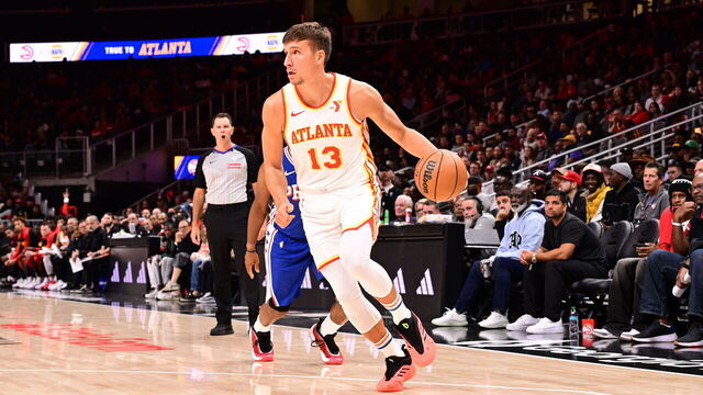 ATLANTA, GA - OCTOBER 14: Bogdan Bogdanovic #13 of the Atlanta Hawks dribbles the ball during the game against the Philadelphia 76ers during a preseason game on October 14, 2024 at State Farm Arena in Atlanta, Georgia. NOTE TO USER: User expressly acknowledges and agrees that, by downloading and/or using this Photograph, user is consenting to the terms and conditions of the Getty Images License Agreement. Mandatory Copyright Notice: Copyright 2024 NBAE