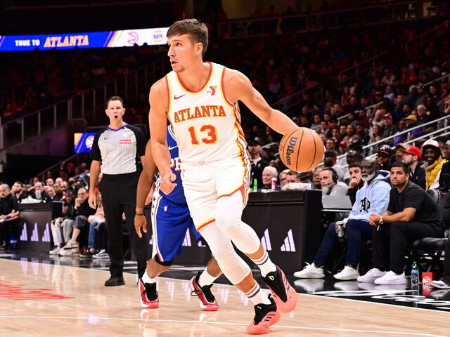 ATLANTA, GA - OCTOBER 14: Bogdan Bogdanovic #13 of the Atlanta Hawks dribbles the ball during the game against the Philadelphia 76ers during a preseason game on October 14, 2024 at State Farm Arena in Atlanta, Georgia. NOTE TO USER: User expressly acknowledges and agrees that, by downloading and/or using this Photograph, user is consenting to the terms and conditions of the Getty Images License Agreement. Mandatory Copyright Notice: Copyright 2024 NBAE