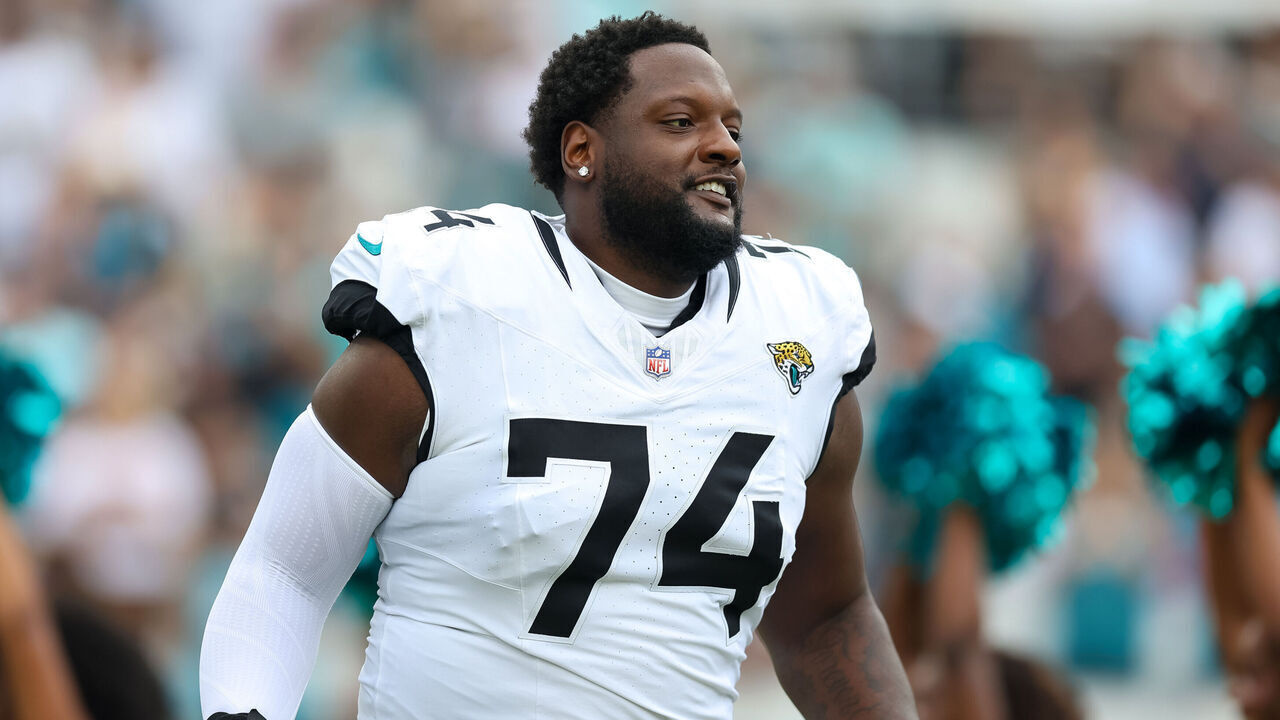 JACKSONVILLE, FLORIDA - SEPTEMBER 15: Cam Robinson #74 of the Jacksonville Jaguars takes the field prior to a game against the Cleveland Browns at EverBank Field on September 15, 2024 in Jacksonville, Florida.