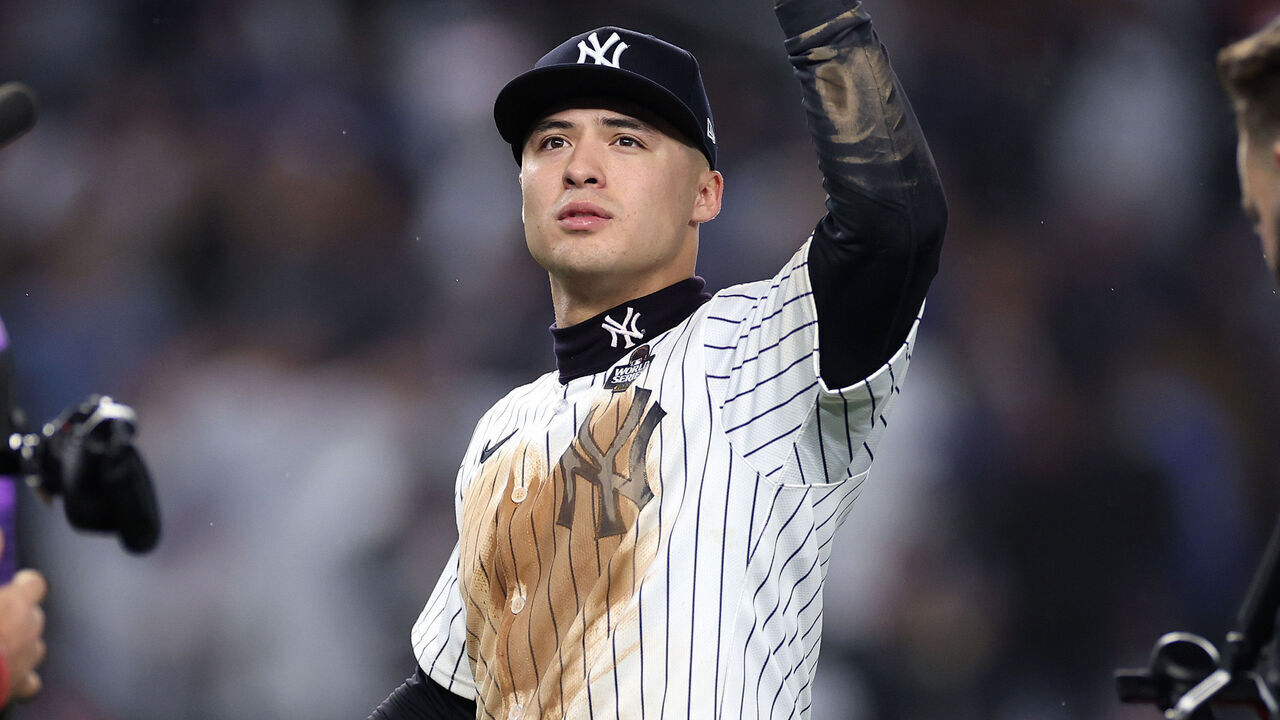 NEW YORK, NEW YORK - OCTOBER 29: Anthony Volpe #11 of the New York Yankees waves toward the crowd after the Yankees defeated the Los Angeles Dodgers 11-4 to win Game Four of the 2024 World Series at Yankee Stadium on October 29, 2024 in the Bronx borough of New York City.