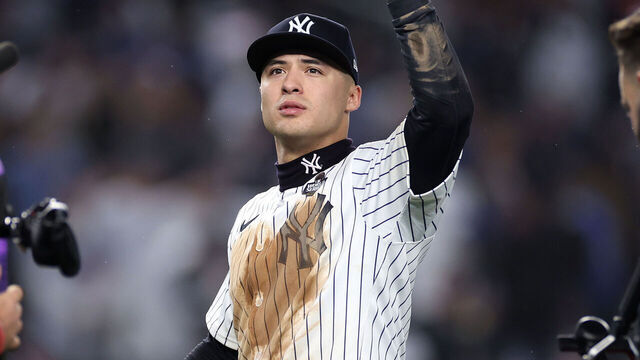 NEW YORK, NEW YORK - OCTOBER 29: Anthony Volpe #11 of the New York Yankees waves toward the crowd after the Yankees defeated the Los Angeles Dodgers 11-4 to win Game Four of the 2024 World Series at Yankee Stadium on October 29, 2024 in the Bronx borough of New York City.