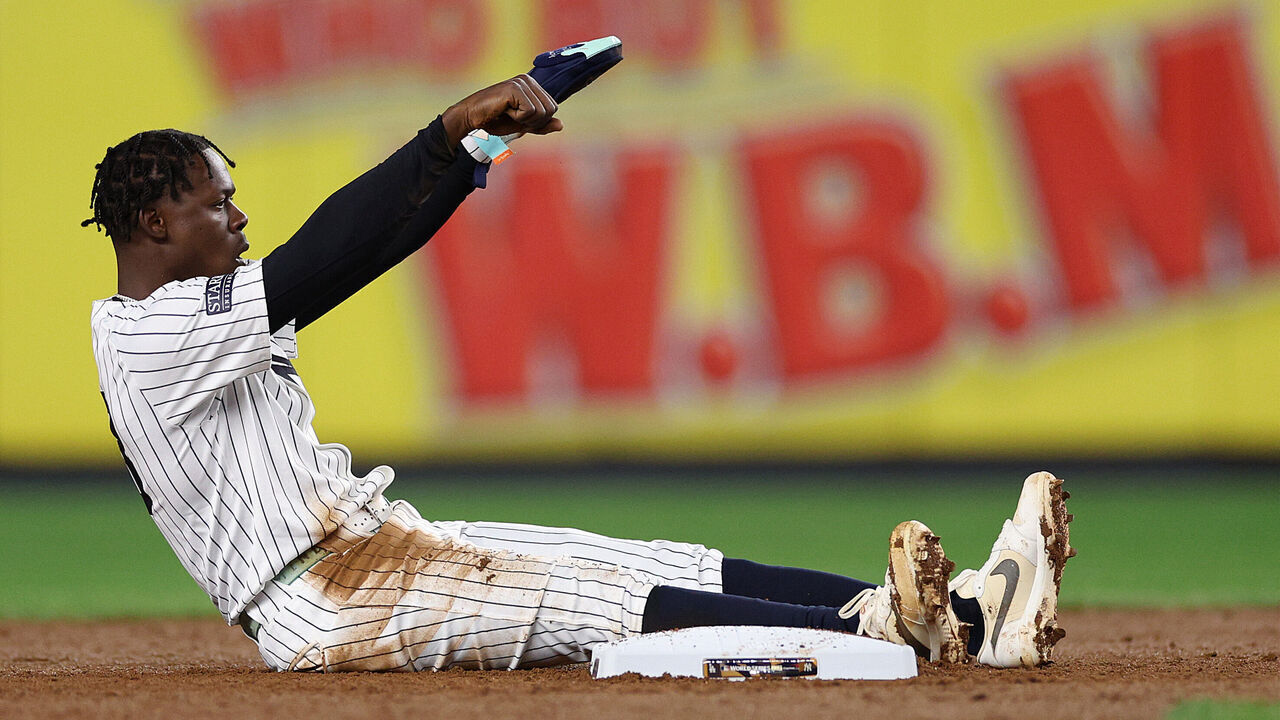 NEW YORK, NEW YORK - OCTOBER 29: Jazz Chisholm Jr. #13 of the New York Yankees steals second base during the third inning of Game Four of the 2024 World Series against the Los Angeles Dodgers at Yankee Stadium on October 29, 2024 in the Bronx borough of New York City.
