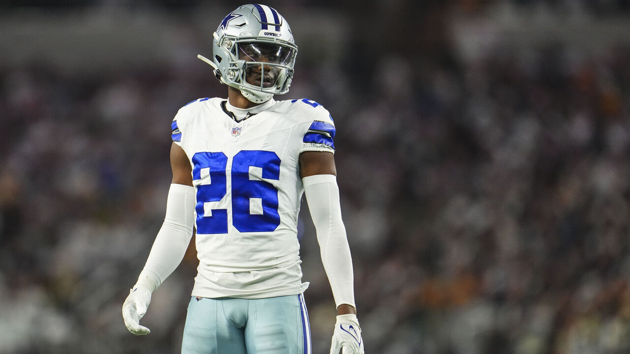 DALLAS, TX - JANUARY 14: DaRon Bland #26 of the Dallas Cowboys looks on from the field during an NFL wild-card playoff football game against the Green Bay Packers at AT&T Stadium on January 14, 2024 in Dallas, Texas.