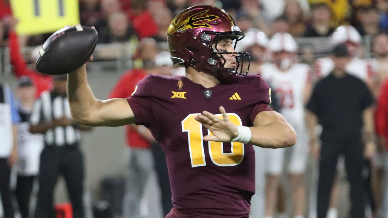 TEMPE, ARIZONA - OCTOBER 11: Sam Leavitt #10 of the Arizona State Sun Devils looks down the field to throw a pass during the first quarter of the Utah Utes against the Arizona State Sun Devils football game at Mountain America Stadium on October 11, 2024 in Tempe, Arizona.