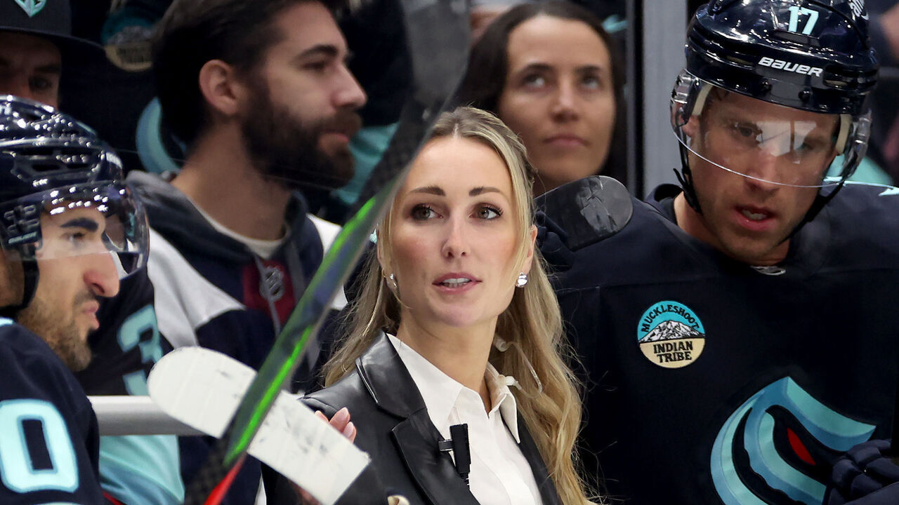 SEATTLE, WASHINGTON - OCTOBER 22: Assistant coach Jessica Campbell of the Seattle Kraken gathers the team together during the third period against the Colorado Avalanche at Climate Pledge Arena on October 22, 2024 in Seattle, Washington.