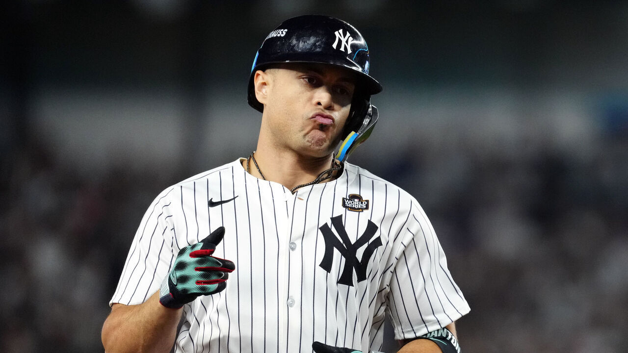 NEW YORK, NY - OCTOBER 30: Giancarlo Stanton #27 of the New York Yankees rounds the bases after hitting a solo home run in the third inning during Game 5 of the 2024 World Series presented by Capital One between the Los Angeles Dodgers and the New York Yankees at Yankee Stadium on Wednesday, October 30, 2024 in New York, New York.