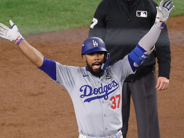 NEW YORK, NEW YORK - OCTOBER 30: Teoscar Hernández #37 of the Los Angeles Dodgers reacts after hitting a two-RBI double to tie the game during the fifth inning of Game Five of the 2024 World Series against the New York Yankees at Yankee Stadium on October 30, 2024 in the Bronx borough of New York City.