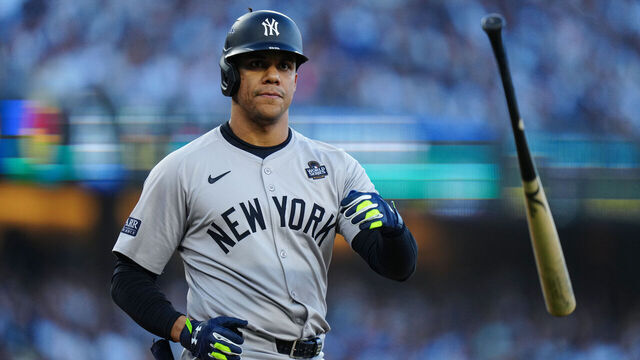 LOS ANGELES, CA - OCTOBER 25: Juan Soto #22 of the New York Yankees tosses his bat after being walked in the first inning of Game 1 of the 2024 World Series presented by Capital One between the New York Yankees and the Los Angeles Dodgers at Dodger Stadium on Friday, October 25, 2024 in Los Angeles, California.