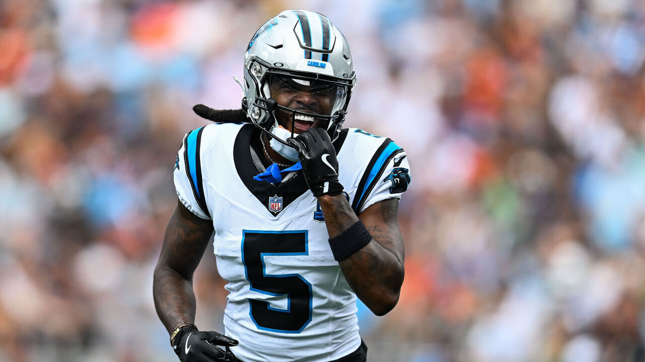 CHARLOTTE, NORTH CAROLINA - SEPTEMBER 29: Diontae Johnson (5) of the Carolina Panthers smiles during the first quarter of his game against the Cincinnati Bengals at Bank of America Stadium on September 29, 2024 in Charlotte, North Carolina.