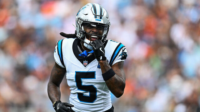 CHARLOTTE, NORTH CAROLINA - SEPTEMBER 29: Diontae Johnson (5) of the Carolina Panthers smiles during the first quarter of his game against the Cincinnati Bengals at Bank of America Stadium on September 29, 2024 in Charlotte, North Carolina.