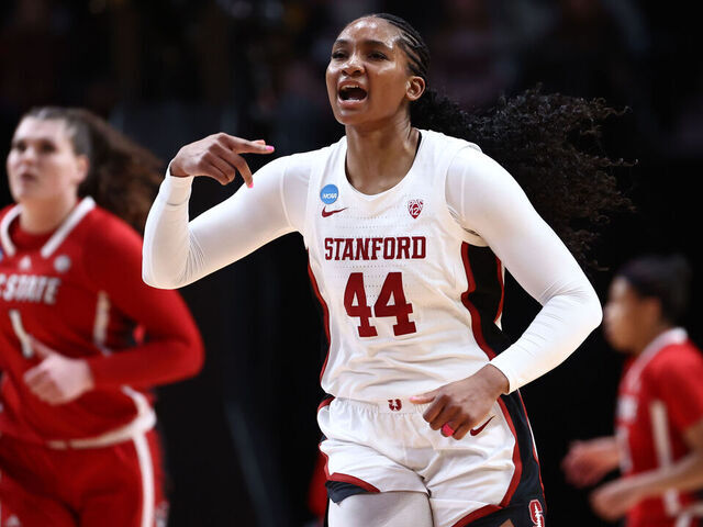 PORTLAND, OREGON - MARCH 29: Kiki Iriafen #44 of the Stanford Cardinal yells after making a three-point basket during the Sweet Sixteen round of the 2024 NCAA Women's Basketball Tournament held at the Moda Center on March 29, 2024 in Portland, Oregon.