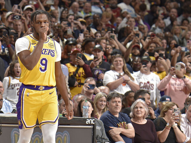 CLEVELAND, OH - OCTOBER 30: Bronny James #9 of the Los Angeles Lakers looks on during the game against the Cleveland Cavaliers on October 30, 2024 at Rocket Mortgage FieldHouse in Cleveland, Ohio. NOTE TO USER: User expressly acknowledges and agrees that, by downloading and/or using this Photograph, user is consenting to the terms and conditions of the Getty Images License Agreement. Mandatory Copyright Notice: Copyright 2024 NBAE