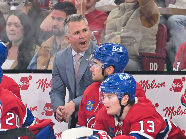 MONTREAL, CANADA - OCTOBER 29: Head coach Martin St-Louis of the Montreal Canadiens handles bench duties during the first period against the Seattle Kraken at the Bell Centre on October 29, 2024 in Montreal, Quebec, Canada. The Seattle Kraken defeated the Montreal Canadiens 8-2.