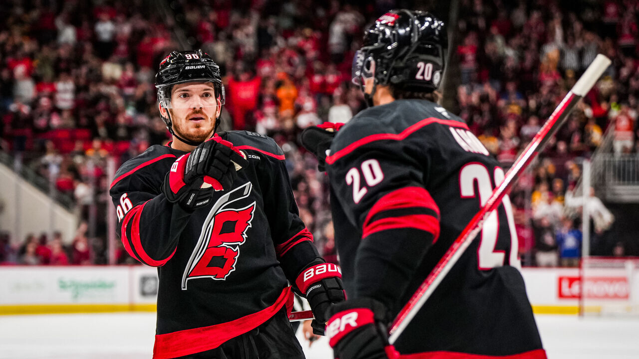RALEIGH, NORTH CAROLINA - OCTOBER 31: Jack Roslovic #96 of the Carolina Hurricanes celebrates after a goal during the first period against the Boston Bruins at Lenovo Center on October 31, 2024 in Raleigh, North Carolina.