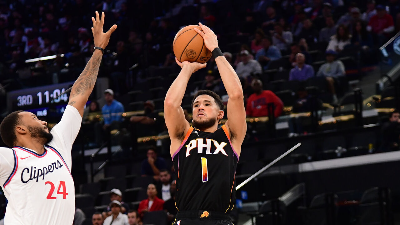 INGLEWOOD, CA - OCTOBER 31: Devin Booker #1 of the Phoenix Suns shoots a three point basket during the game against the LA Clippers on October 31, 2024 at Intuit Dome in Los Angeles, California. NOTE TO USER: User expressly acknowledges and agrees that, by downloading and/or using this Photograph, user is consenting to the terms and conditions of the Getty Images License Agreement. Mandatory Copyright Notice: Copyright 2024 NBAE