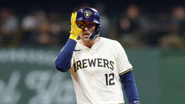MILWAUKEE, WISCONSIN - SEPTEMBER 18: Rhys Hoskins #12 of the Milwaukee Brewers reacts toward the dugout after hitting a double in the second inning against the Philadelphia Phillies at American Family Field on September 18, 2024 in Milwaukee, Wisconsin.