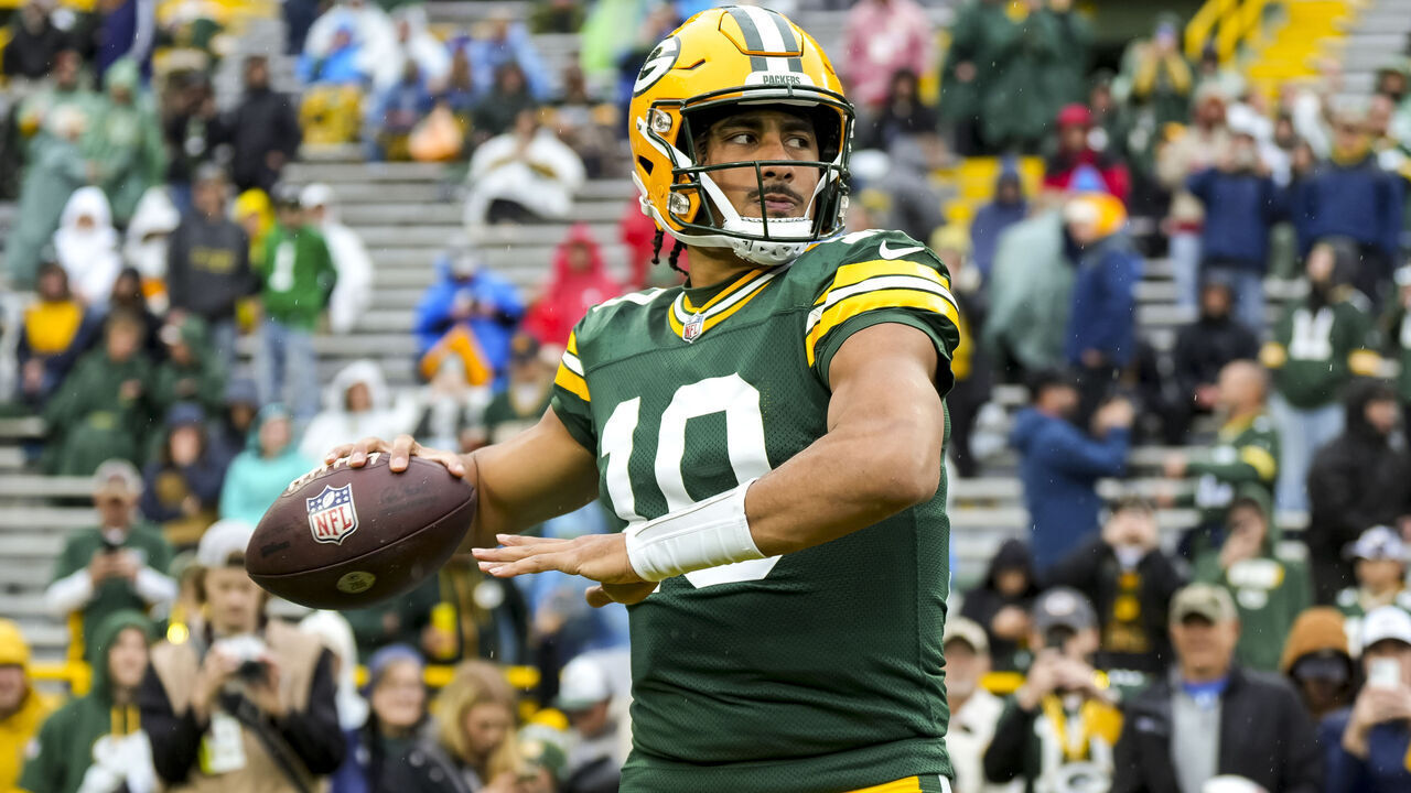 GREEN BAY, WISCONSIN - OCTOBER 13: Quarterback Jordan Love #10 of the Green Bay Packers warms up prior to an NFL football game against the Arizona Cardinals, at Lambeau Field on October 13, 2024 in Green Bay, Wisconsin.