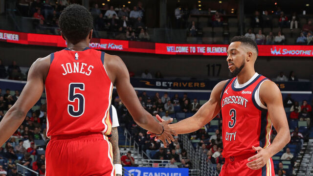 NEW ORLEANS, LA - DECEMBER 11: Herb Jones #5 and CJ McCollum #3 of the New Orleans Pelicans high five during the game against the Minnesota Timberwolves on December 11, 2023 at the Smoothie King Center in New Orleans, Louisiana. Mandatory Copyright Notice: Copyright 2023 NBAE
