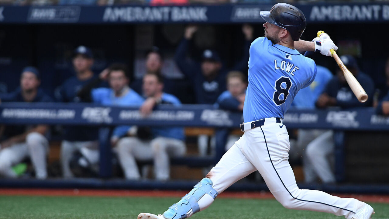 ST PETERSBURG, FLORIDA - SEPTEMBER 22: Brandon Lowe #8 of the Tampa Bay Rays connects for an eighth inning home run against the Toronto Blue Jays at Tropicana Field on September 22, 2024 in St Petersburg, Florida.