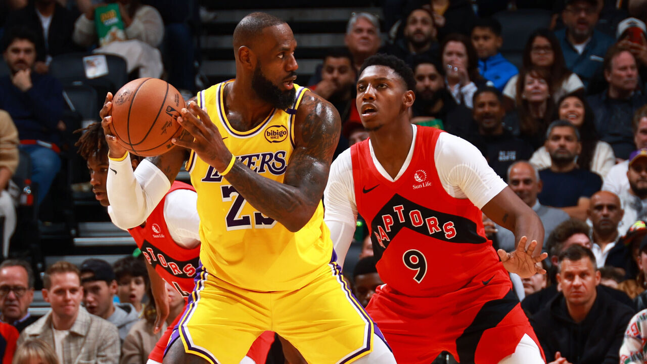 TORONTO, CANADA - NOVEMBER 1: LeBron James #23 of the Los Angeles Lakers handles the ball during the game against the Toronto Raptors on November 1, 2024 at the Scotiabank Arena in Toronto, Ontario, Canada. Mandatory Copyright Notice: Copyright 2024 NBAE