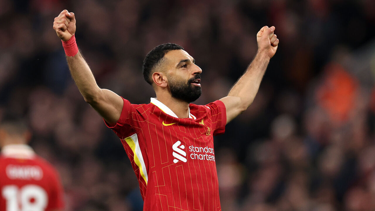 LIVERPOOL, ENGLAND - NOVEMBER 02: Mohamed Salah of Liverpool celebrates scoring his team's second goal during the Premier League match between Liverpool FC and Brighton & Hove Albion FC at Anfield on November 02, 2024 in Liverpool, England.