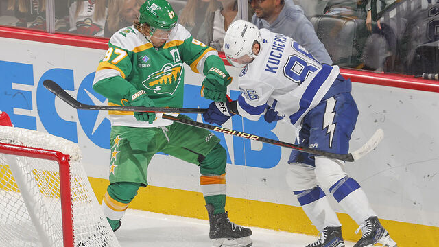 SAINT PAUL, MN - NOVEMBER 1: Kirill Kaprizov #97 of the Minnesota Wild and Nikita Kucherov #86 of the Tampa Bay Lightning battle for the puck during the game at the Xcel Energy Center on November 1, 2024 in Saint Paul, Minnesota.