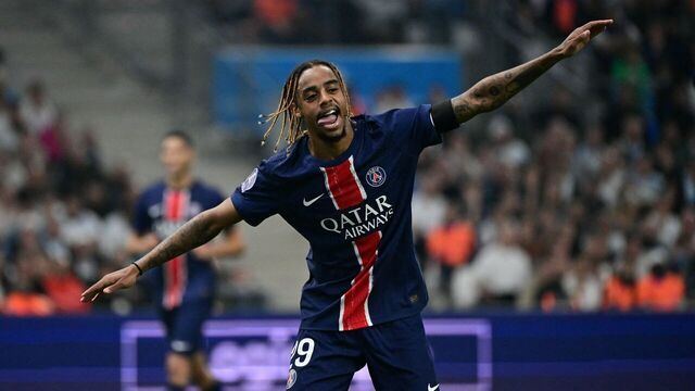 Paris Saint-Germain's French forward #29 Bradley Barcola celebrates after scoring his team's third goal during the French L1 football match between Olympique de Marseille (OM) and Paris Saint-Germain (PSG) at the Velodrome Stadium in Marseille, southeastern France, on October 27, 2024.