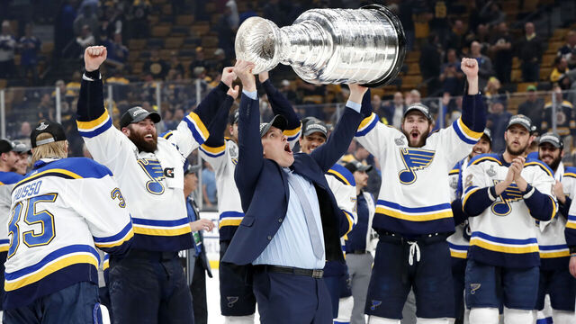 BOSTON, MA - JUNE 12: St. Louis Blues head coach Craig Berube lifts the Cup after Game 7 of the Stanley Cup Final between the Boston Bruins and the St. Louis Blues on June 12, 2019, at TD Garden in Boston, Massachusetts.
