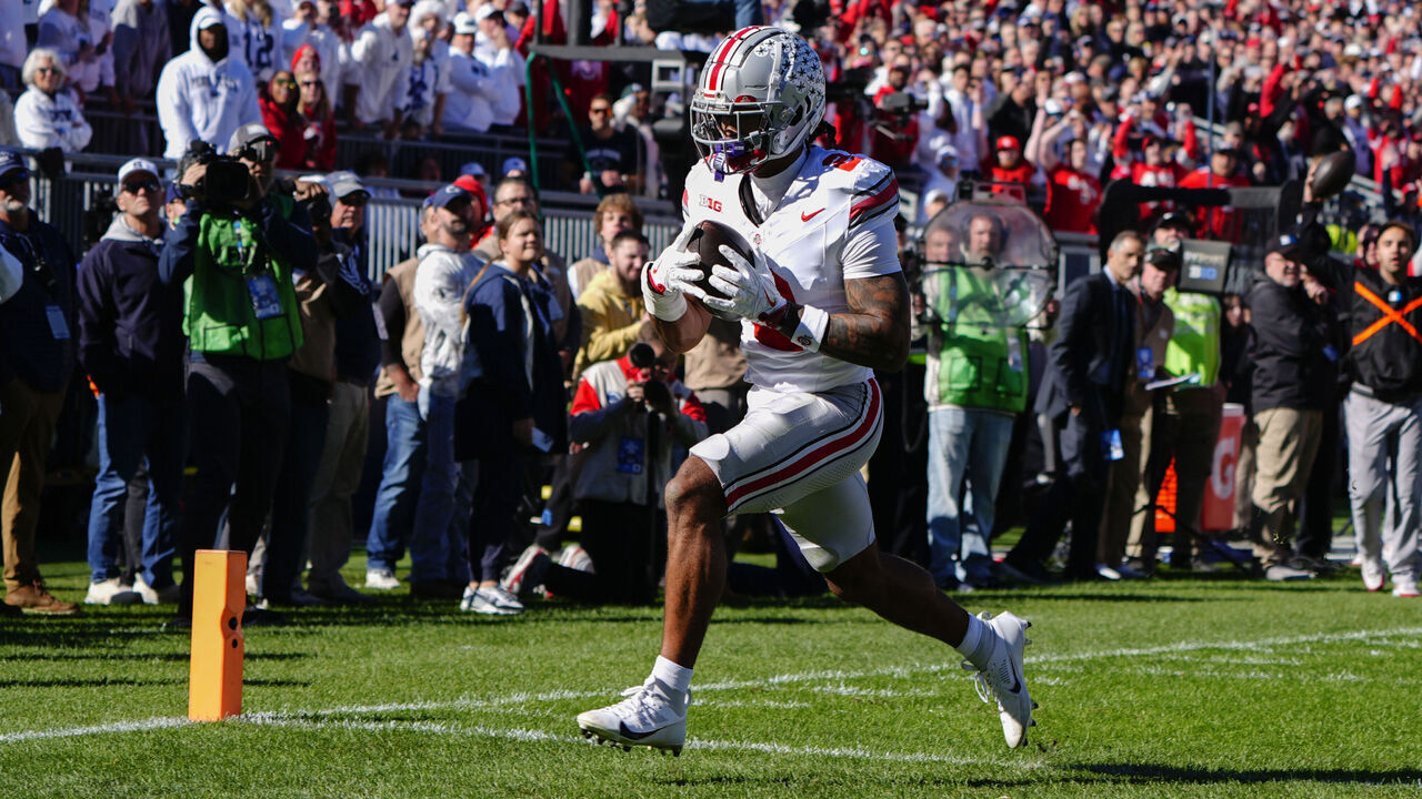 UNIVERSITY PARK, PA - NOVEMBER 02: Ohio State Buckeyes Wide Receiver Emeka Egbuka (2) runs with the ball for a touchdown after making a catch during the first half of the College Football game between the Ohio State Buckeyes and the Penn State Nittany Lions on November 2, 2024, at Beaver Stadium in University Park, PA.