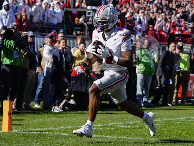 UNIVERSITY PARK, PA - NOVEMBER 02: Ohio State Buckeyes Wide Receiver Emeka Egbuka (2) runs with the ball for a touchdown after making a catch during the first half of the College Football game between the Ohio State Buckeyes and the Penn State Nittany Lions on November 2, 2024, at Beaver Stadium in University Park, PA.