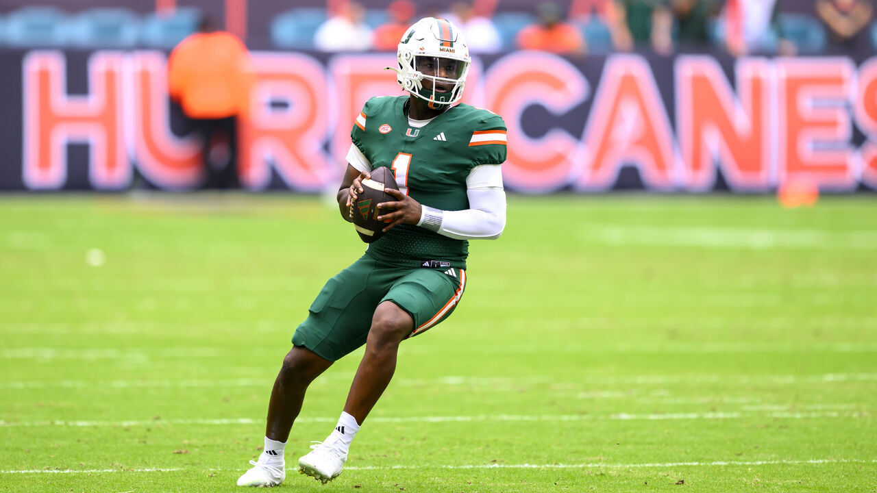 MIAMI GARDENS, FL - NOVEMBER 02: Miami quarterback Cam Ward (1) looks to throw the ball Miami wide receiver Xavier Restrepo (not shown) for a touchdown during the college football game between the Duke Blue Devils and the University of Miami Hurricanes on November 2, 2024 at the Hard Rock Stadium in Miami Gardens, FL.