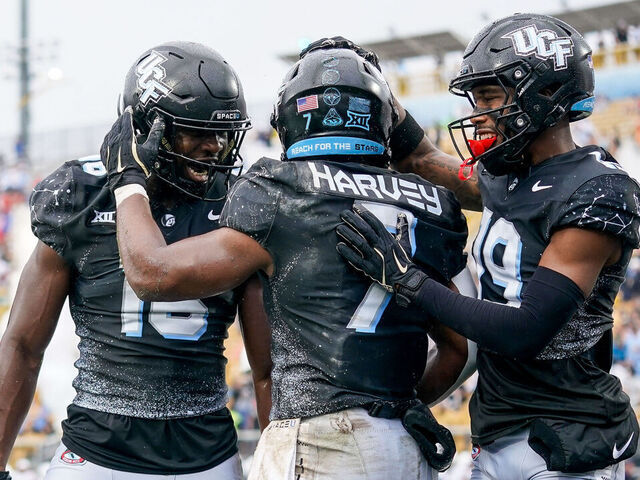 ORLANDO, FL - NOVEMBER 02: UCF Knights running back RJ Harvey (7) celebrates with teammates after a touchdown during a game between the Arizona Wildcats and the UCF Knights on November 02, 2024 at FBC Mortgage Stadium in Orlando, FL