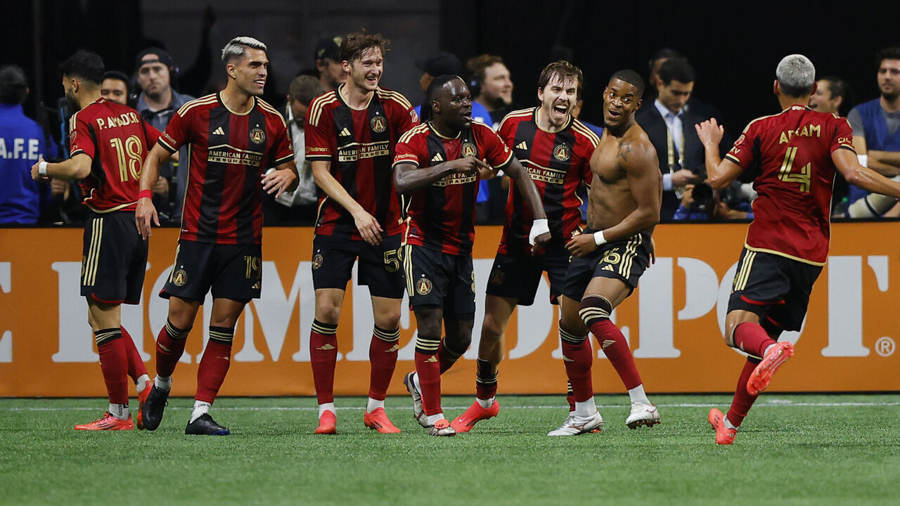 ATLANTA, GEORGIA - NOVEMBER 02: Xande Silva #16 of Atlanta United celebrates with teammates after scoring a goal against Inter Miami during the second half of the 2024 MLS Cup Playoffs at Mercedes-Benz Stadium on November 02, 2024 in Atlanta, Georgia.