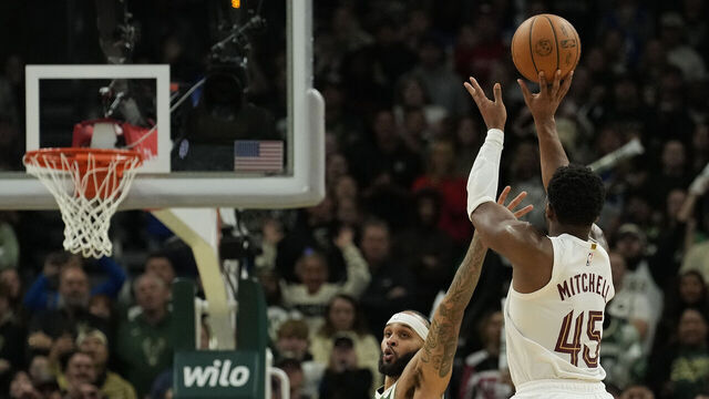 MILWAUKEE, WISCONSIN - NOVEMBER 02: Donovan Mitchell #45 of the Cleveland Cavaliers shoots the ball against Gary Trent Jr. #5 of the Milwaukee Bucks at the end of the fourth quarter of a game at Fiserv Forum on November 02, 2024 in Milwaukee, Wisconsin.