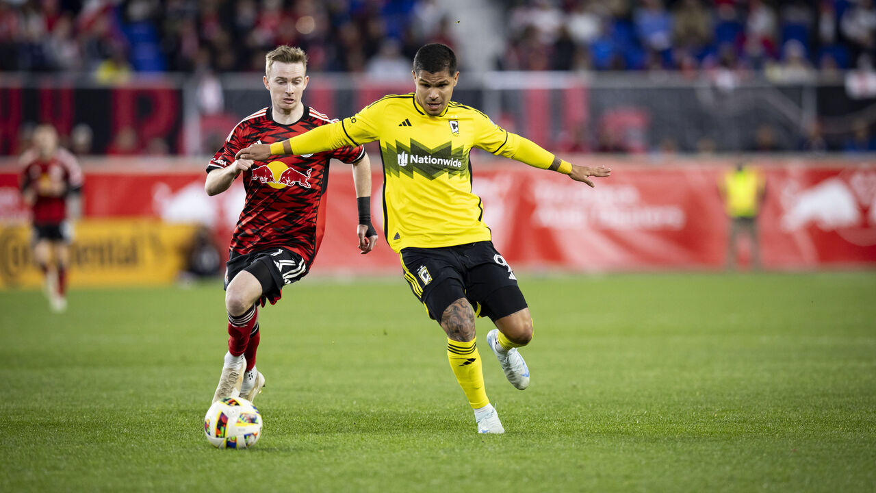 HARRISON, NEW JERSEY - NOVEMBER 3: Cucho Hernandez #9 of Columbus Crew battles for control of the ball against Cameron Harper #17 of New York Red Bulls in the first half of game two in the first round of the 2024 MLS Playoffs at Red Bull Arena on November 3, 2024 in Harrison, New Jersey.