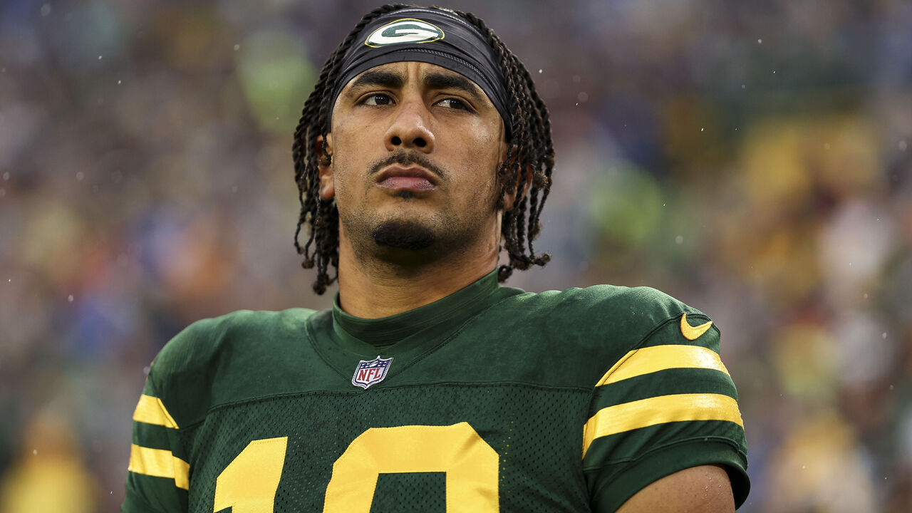 GREEN BAY, WISCONSIN - NOVEMBER 03: Jordan Love #10 of the Green Bay Packers stands on the sidelines during the national anthem prior to an NFL football game against the Detroit Lions at Lambeau Field on November 3, 2024 in Green Bay, Wisconsin.