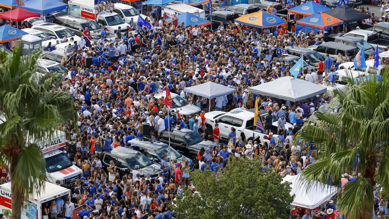 JACKSONVILLE, FL - NOVEMBER 02: Fans crowd a tailgate area before the game between the Georgia Bulldogs and the Florida Gators on November 2, 2024 at EverBank Stadium in Jacksonville, Fl.