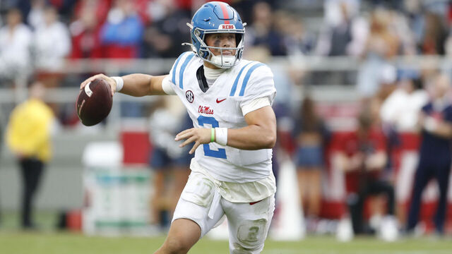 FAYETTEVILLE, AR - NOVEMBER 02: Mississippi Rebels quarterback Jaxson Dart (2) looks to pass the football during the college football game between the Mississippi Rebels and Arkansas Razorbacks on November 2, 2024, at Donald W. Reynolds Razorback Stadium in Fayetteville, Arkansas.