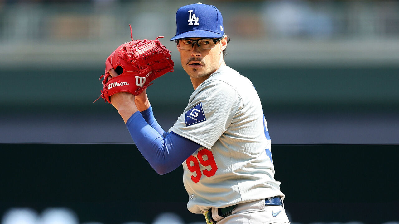 MINNEAPOLIS, MINNESOTA - APRIL 10: Joe Kelly #99 of the Los Angeles Dodgers delivers a pitch against the Minnesota Twins in the eighth inning at Target Field on April 10, 2024 in Minneapolis, Minnesota. The Twins defeated the Dodgers 3-2.