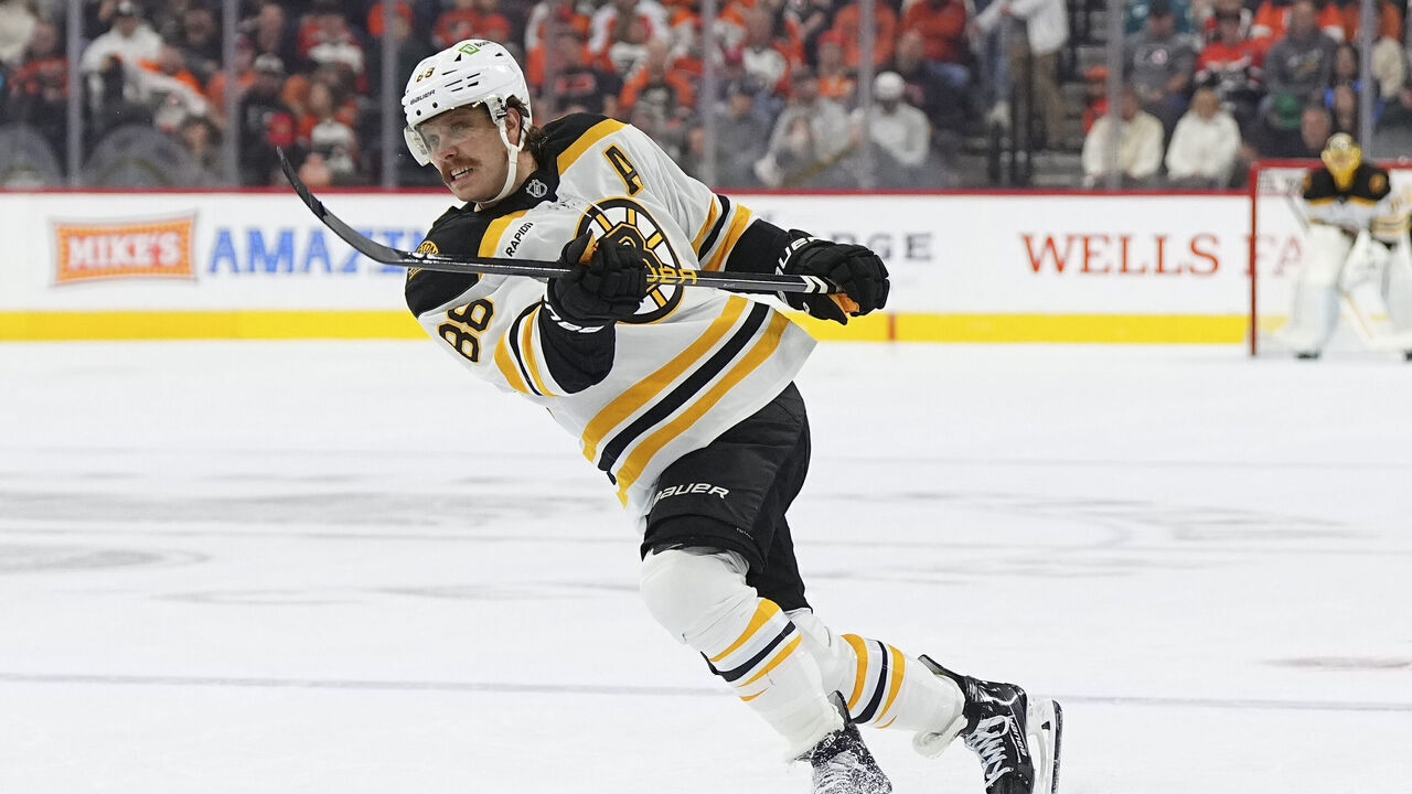 PHILADELPHIA, PENNSYLVANIA - NOVEMBER 2: David Pastrnak #88 of the Boston Bruins shoots the puck against the Philadelphia Flyers at the Wells Fargo Center on November 2, 2024 in Philadelphia, Pennsylvania. The Bruins defeated the Flyers 3-0.