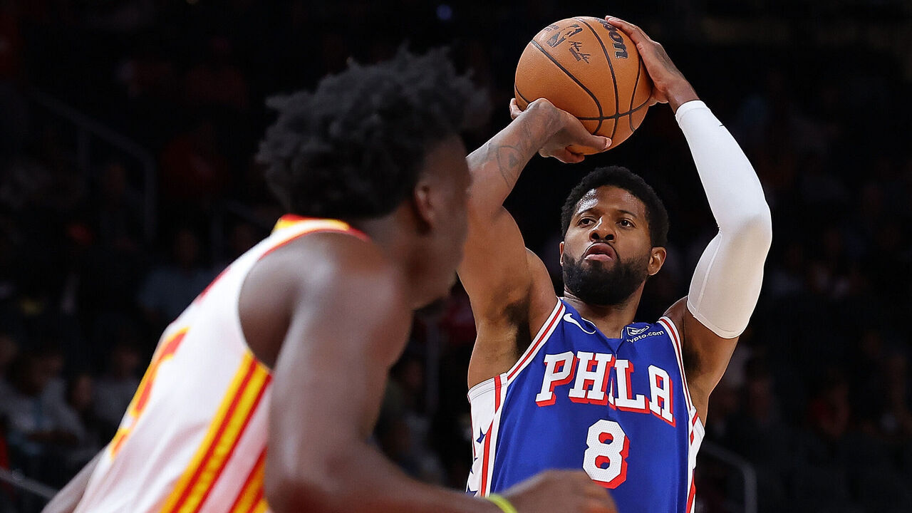 ATLANTA, GEORGIA - OCTOBER 14: Paul George #8 of the Philadelphia 76ers attempts a shot against Clint Capela #15 of the Atlanta Hawks during the first quarter at State Farm Arena on October 14, 2024 in Atlanta, Georgia. NOTE TO USER: User expressly acknowledges and agrees that, by downloading and/or using this photograph, user is consenting to the terms and conditions of the Getty Images License Agreement.