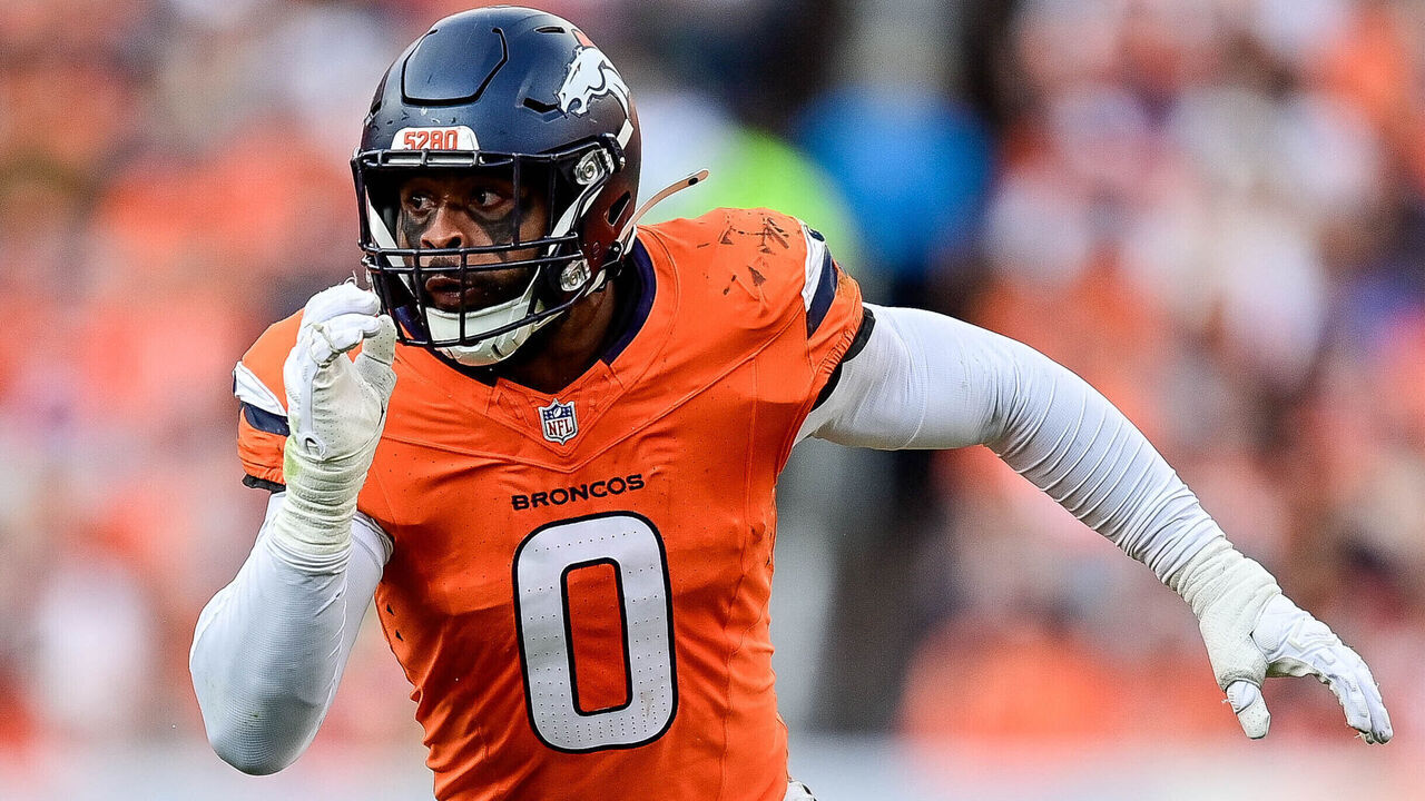 DENVER, CO - OCTOBER 27: Denver Broncos linebacker Jonathon Cooper (0) jumps on defense during a game between the Carolina Panthers and the Denver Broncos at Empower Field at Mile High on October 27, 2024 in Denver, Colorado.