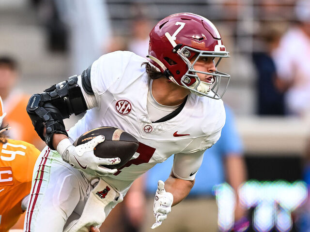 KNOXVILLE, TN - OCTOBER 19: Alabama Crimson Tide wide receiver Cole Adams (7) is tripped up by Tennessee Volunteers long snapper Matthew Salansky (47) during the college football game between the Tennessee Volunteers and the Alabama Crimson Tide on October 19, 2024, at Neyland Stadium in Knoxville, TN.