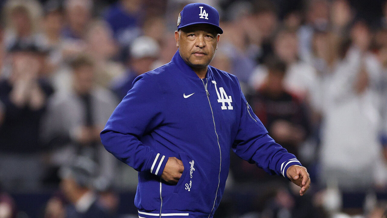 NEW YORK, NEW YORK - OCTOBER 30: Manager Dave Roberts #30 of the Los Angeles Dodgers walks back to the dugout after relieving starting pitcher Jack Flaherty #0 during the second inning of Game Five of the 2024 World Series against the New York Yankees at Yankee Stadium on October 30, 2024 in the Bronx borough of New York City.