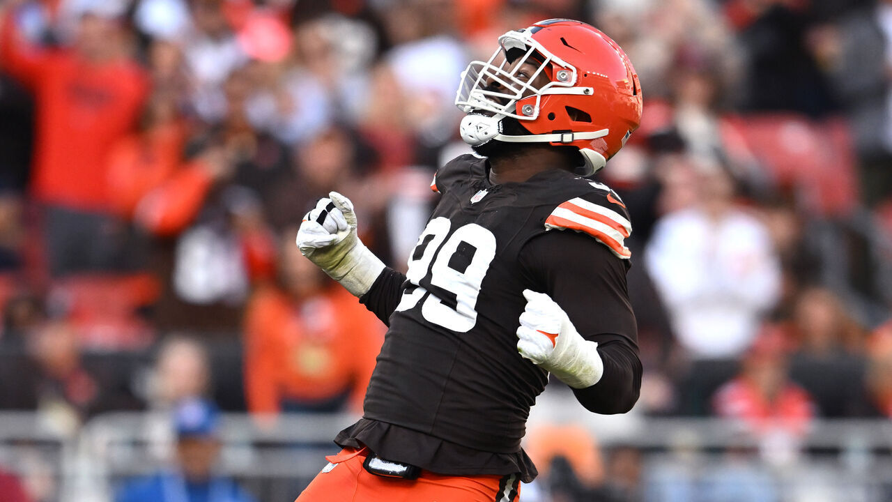 CLEVELAND, OHIO - OCTOBER 27: Za'Darius Smith #99 of the Cleveland Browns celebrates after a sack in the fourth quarter of a game against the Baltimore Ravens at Huntington Bank Field on October 27, 2024 in Cleveland, Ohio.