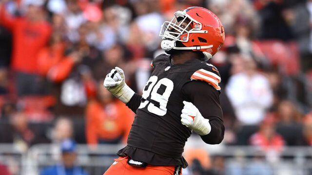 CLEVELAND, OHIO - OCTOBER 27: Za'Darius Smith #99 of the Cleveland Browns celebrates after a sack in the fourth quarter of a game against the Baltimore Ravens at Huntington Bank Field on October 27, 2024 in Cleveland, Ohio.