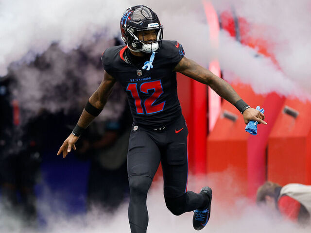HOUSTON, TEXAS - OCTOBER 06: Nico Collins #12 of the Houston Texans takes the field during the game against the Buffalo Bills at NRG Stadium on October 06, 2024 in Houston, Texas.